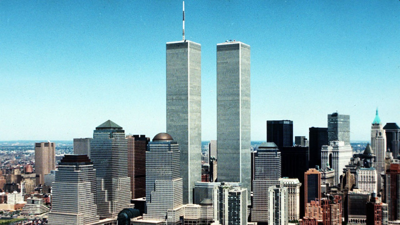 a city skyline with tall buildings