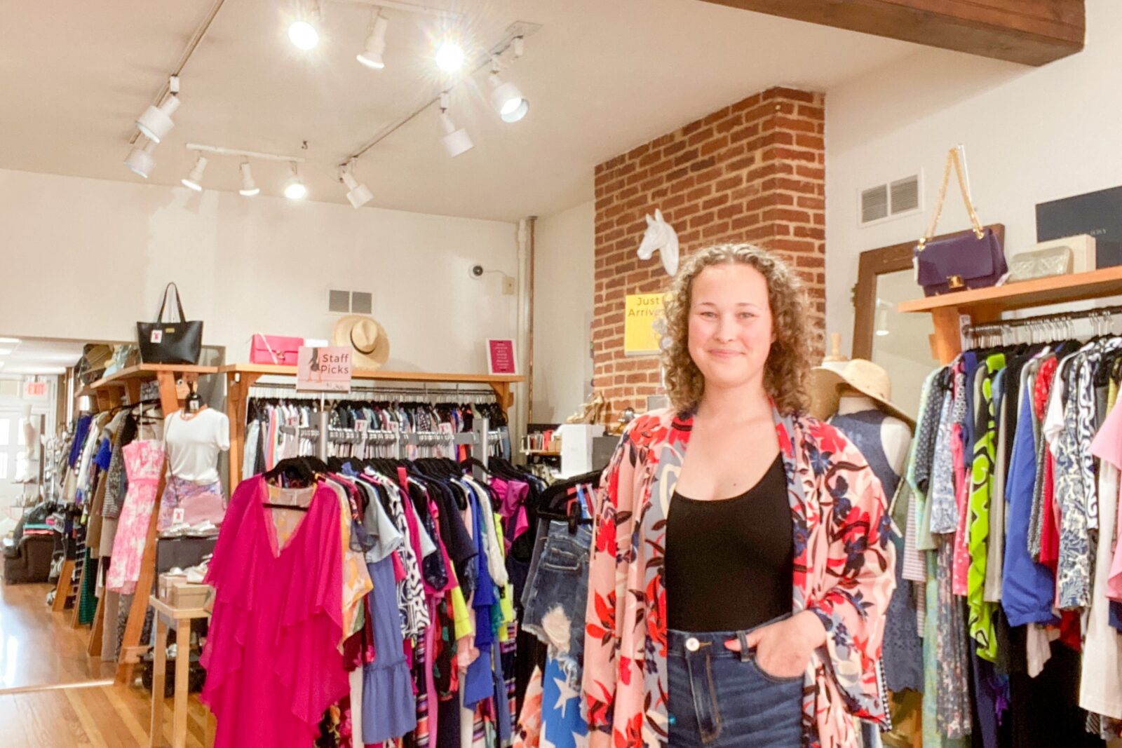 a person standing in a clothing store