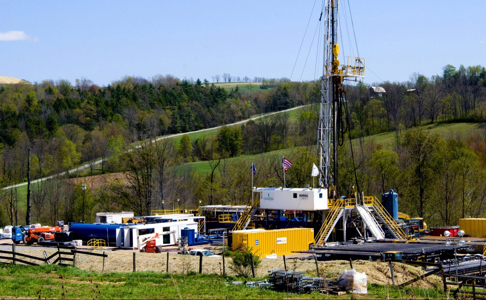 a large metal tower with a crane