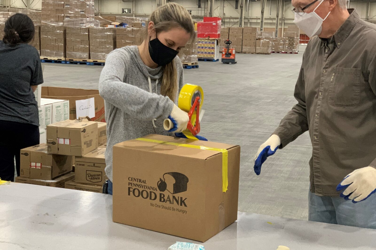 people in a warehouse