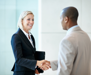 a man and a woman shaking hands