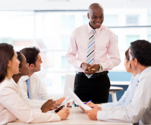 a person talking to a group of people
