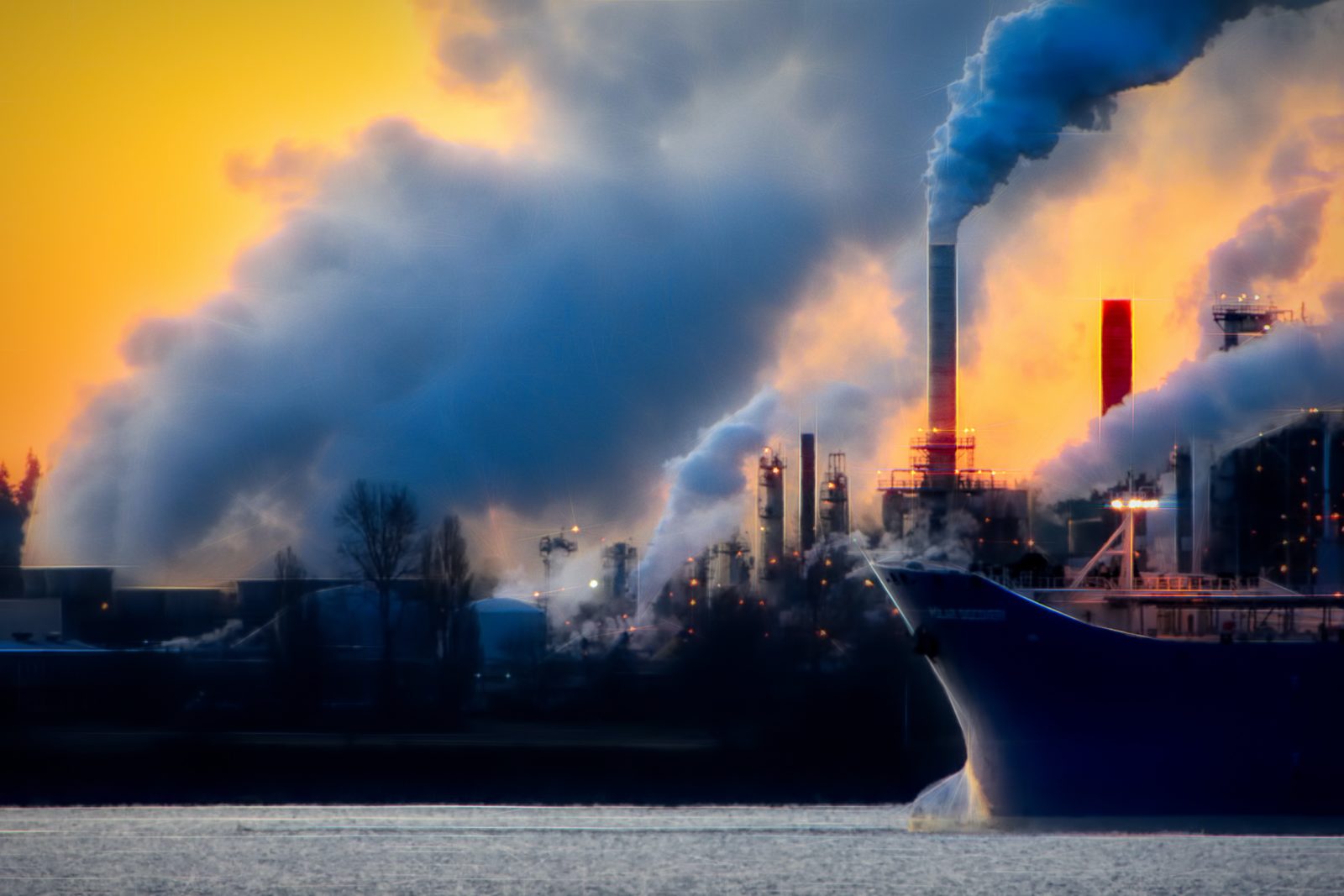 a factory with smoke coming out of it