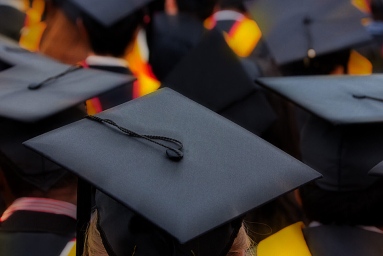 a group of people at graduation