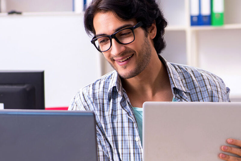 man on computer