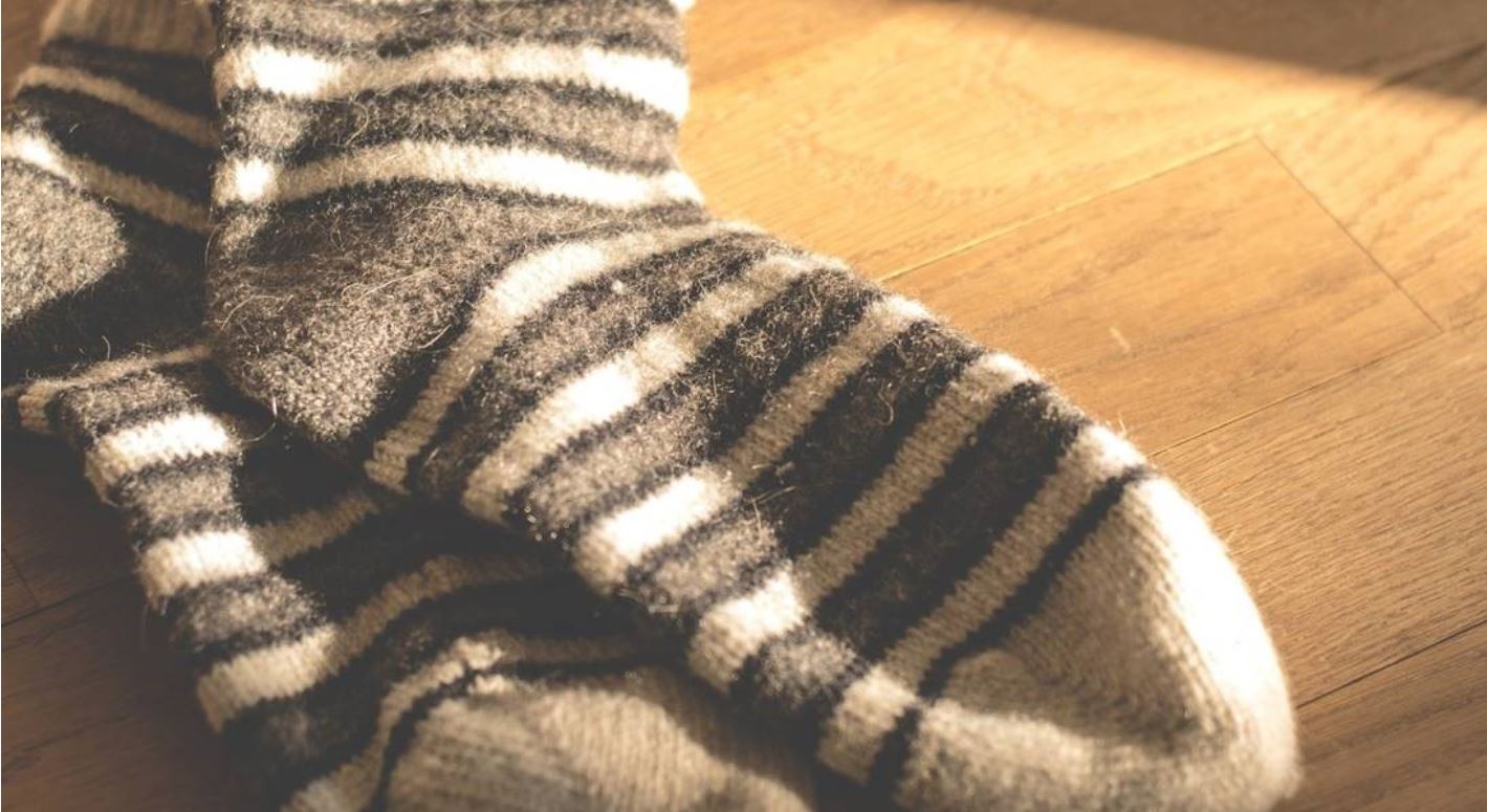 a black and white striped sock