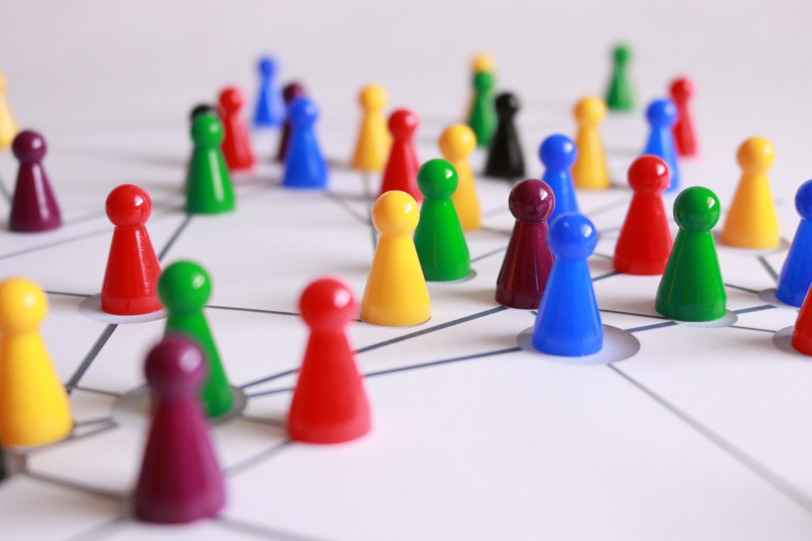 a group of colorful chess pieces